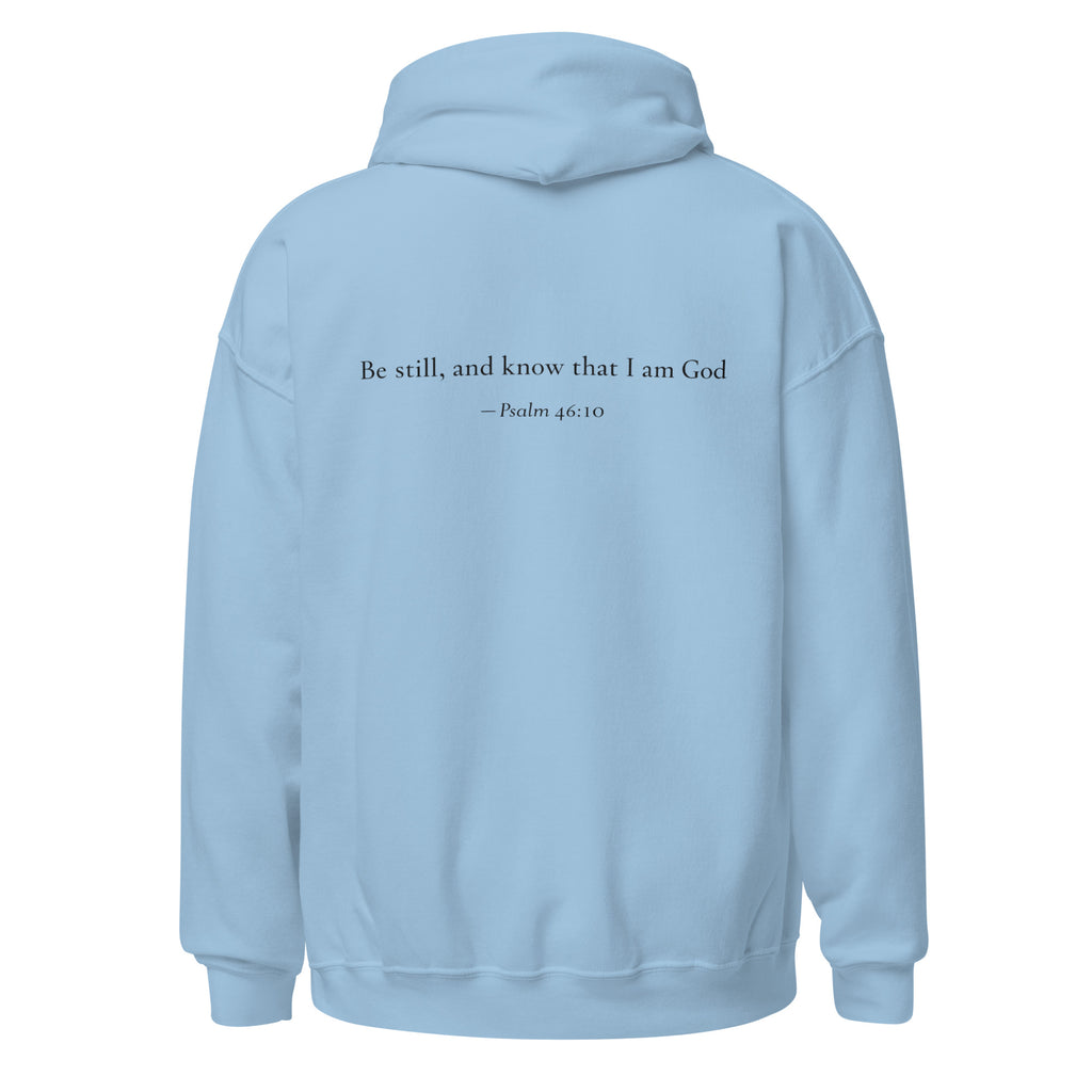 Light blue heavy blend fleece hoodie with small chest BE STILL quote, back view