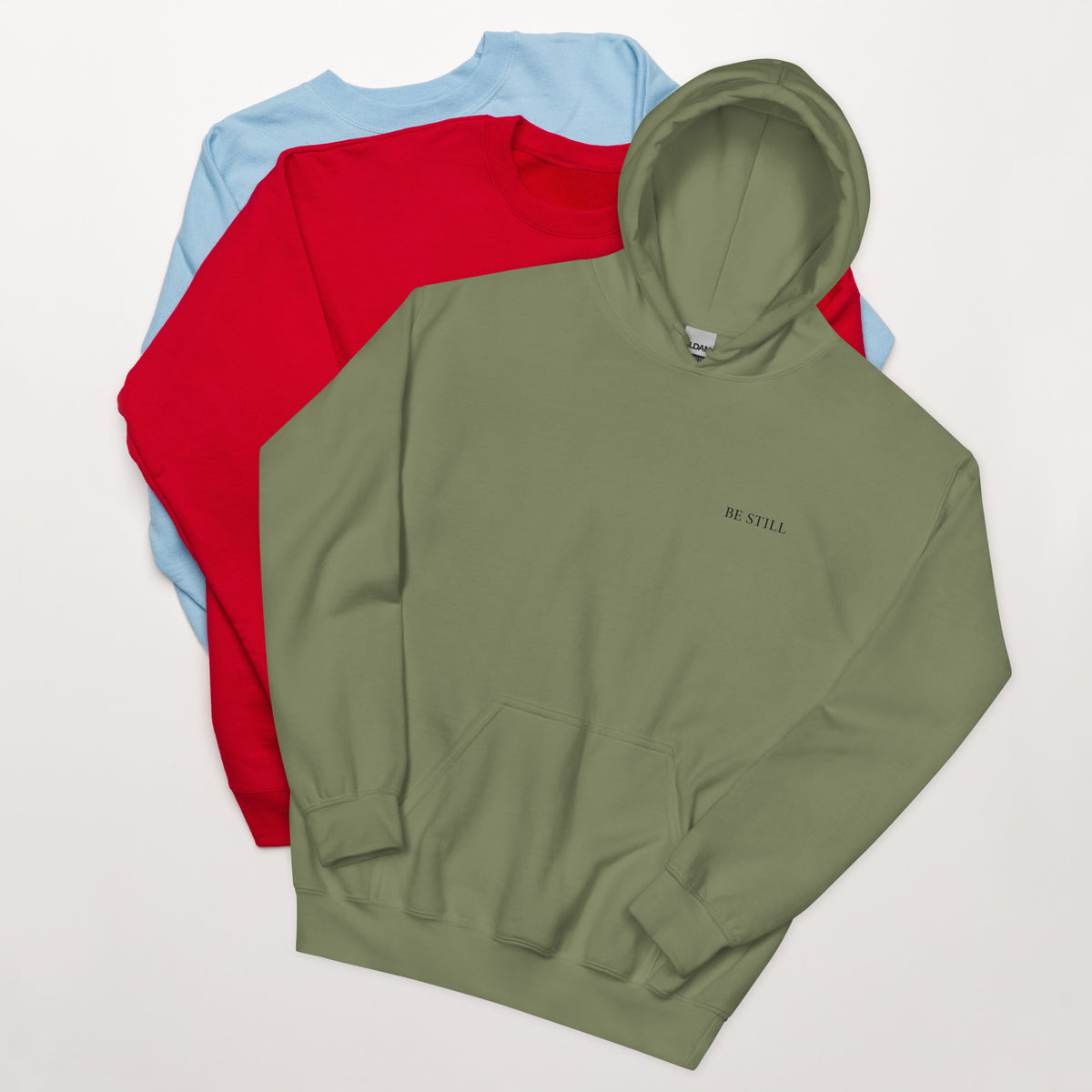 Military green heavy blend fleece hoodie with small chest BE STILL quote, front detail