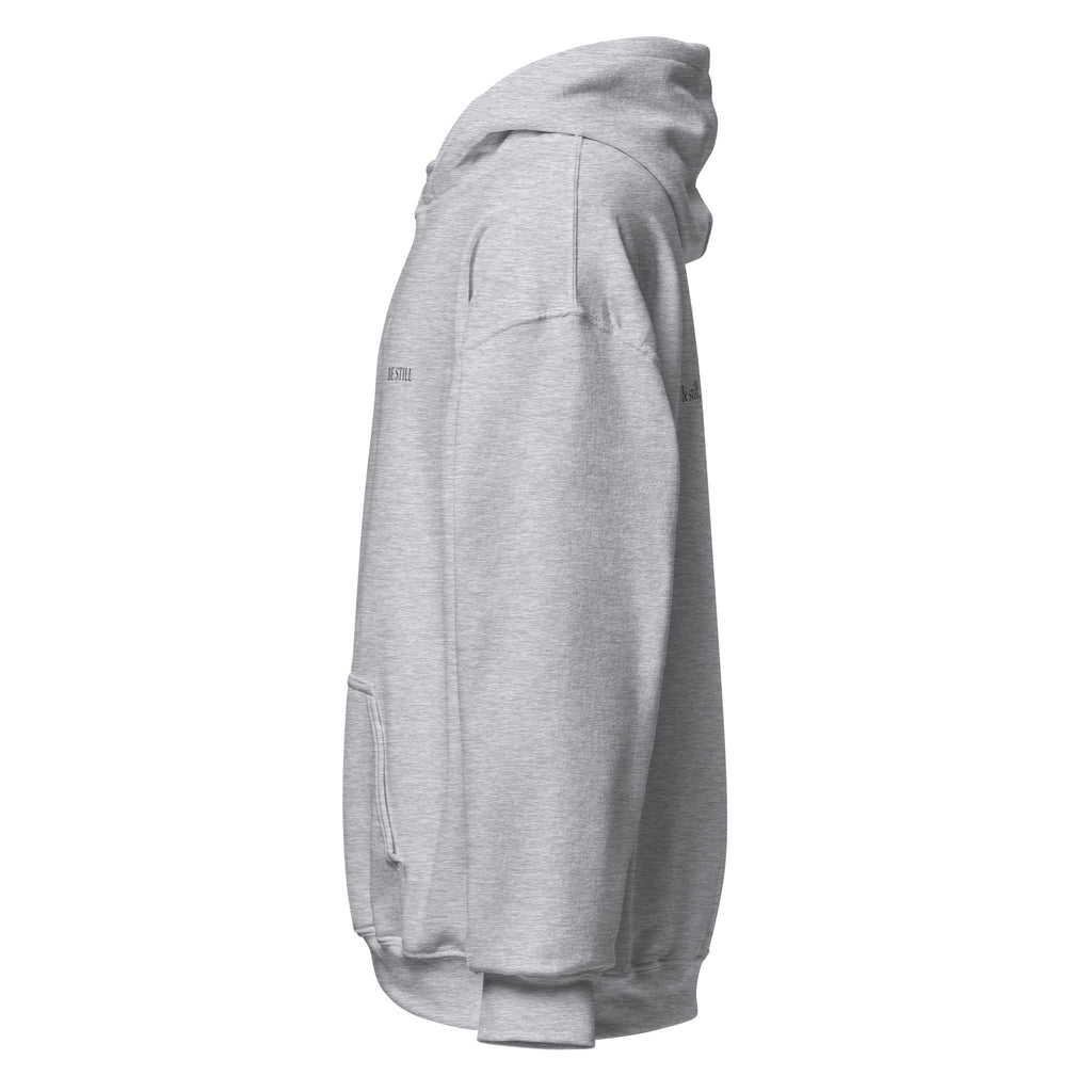 Sport grey heavy blend fleece hoodie with small chest BE STILL quote, left side view