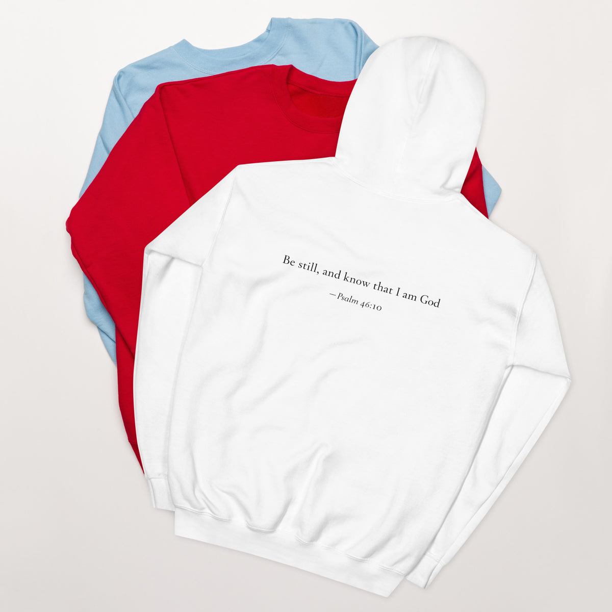 White heavy blend fleece hoodie with small chest BE STILL quote, back detail
