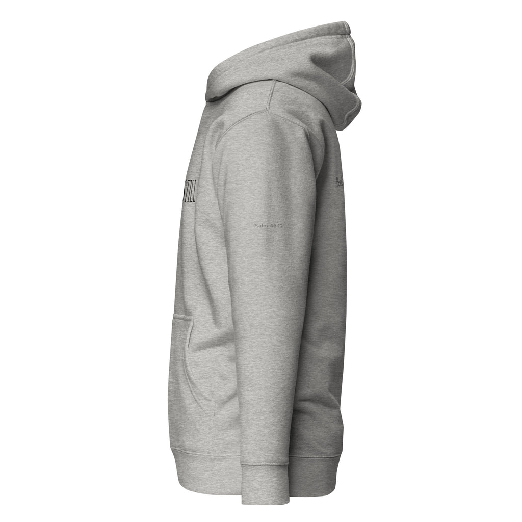 Carbon grey premium pullover hoodie with large chest BE STILL quote, left side view