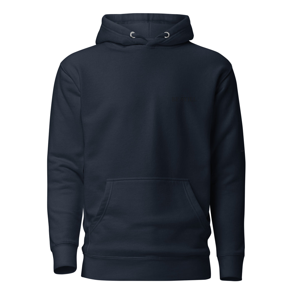 Navy premium pullover hoodie with small chest BE STILL quote, front view