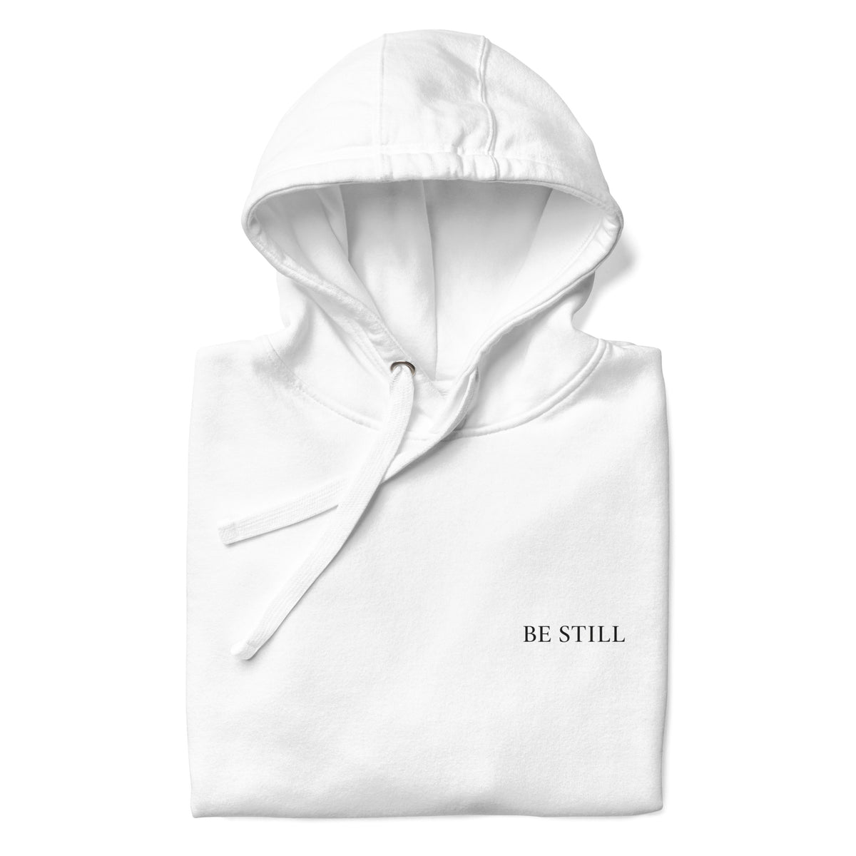 White premium pullover hoodie with small chest BE STILL quote, front detail